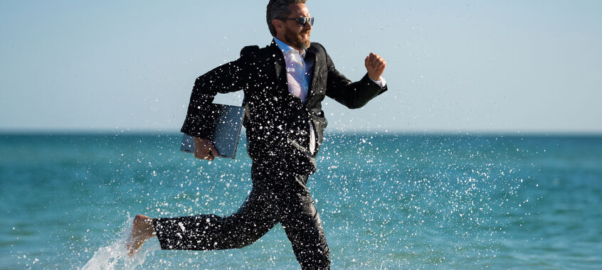 bigstock Business Man In Suit With Lapt 475780455