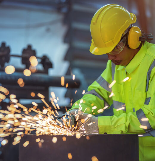 bigstock A Worker Is Using A Steel Grin 462535443