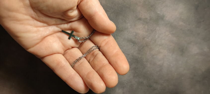 bigstock Orthodox Silver Cross On A Cha 438436745