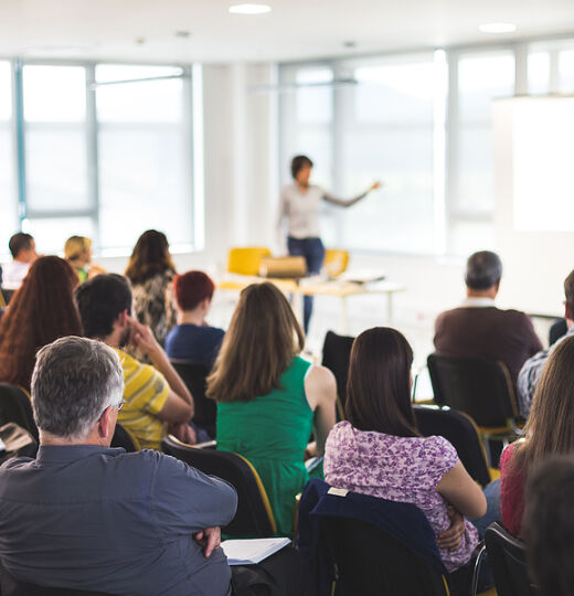 bigstock Speaker Giving A Talk In Confe 400239761