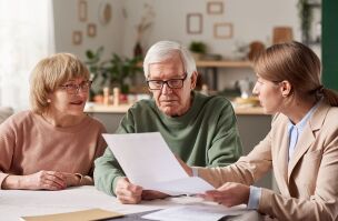 bigstock Senior Couple Sitting At The T 409811209