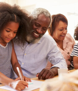 bigstock Grandparents Sitting At Table  306901027