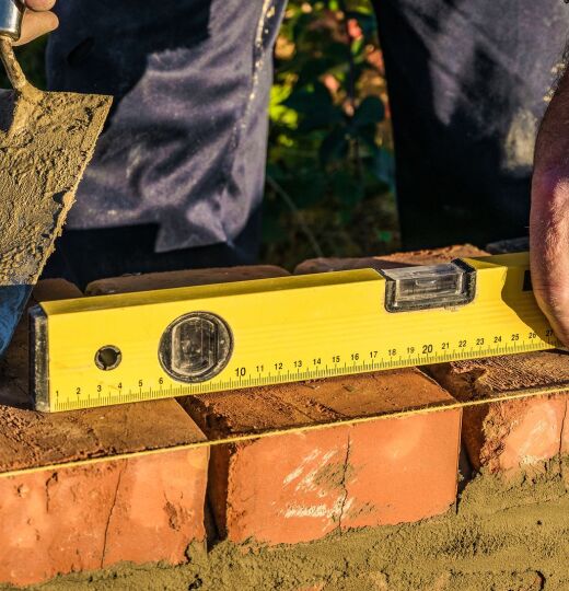 bigstock Bricklayer Checks The Horizont 290852368