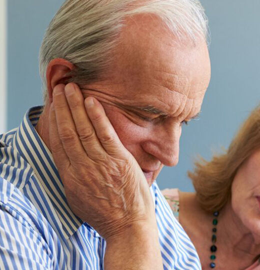 Asbestos woman comforting husband