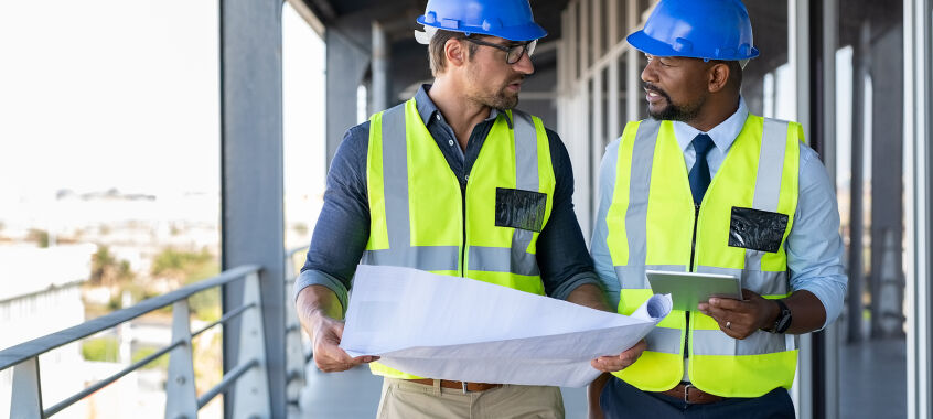 bigstock Metalworker and engineer meeti 353046842