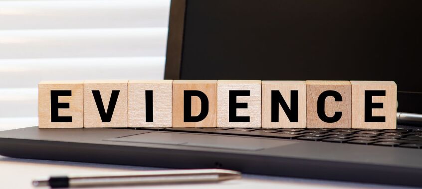 bigstock Evidence Word Written On Wood  396871874