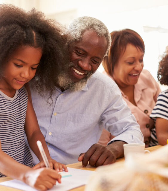 bigstock Grandparents Sitting At Table  306901027