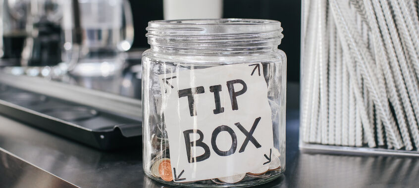 bigstock Glass Of Tip Box Tag And Few C 389477761