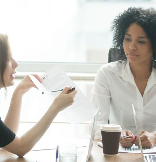 bigstock Diverse Employees Arguing Duri 240333181