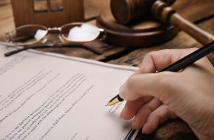 bigstock Woman Signing Last Will And Te 462384991 (1)