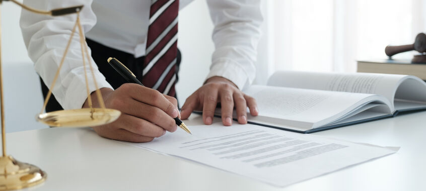 bigstock Lawyer Sitting Working At The  457208169