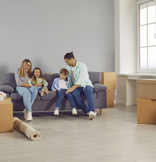 bigstock Happy Young Family Sitting On  470148367