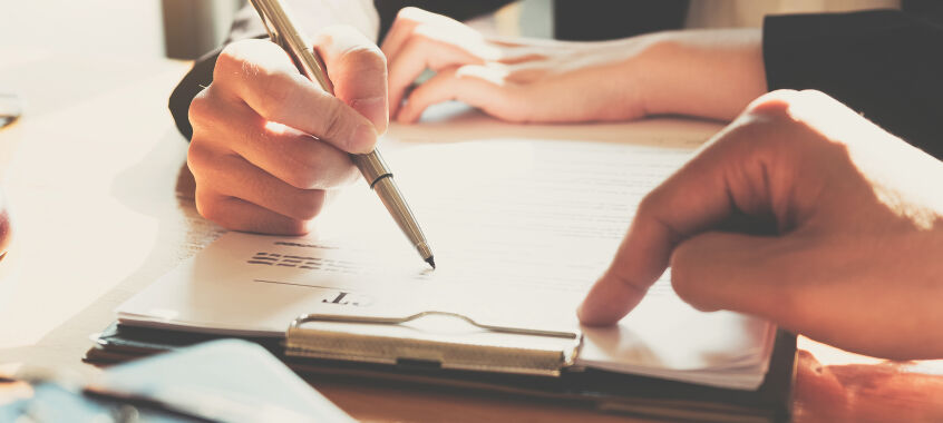 bigstock Business Woman Signing A Contr 325529257