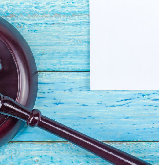 Gavel on blue background   Dis Res