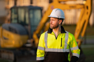 bigstock Worker In Helmet On Site Const 474716219