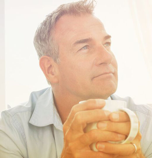 couple with tea looking thoughtful after diagnosis
