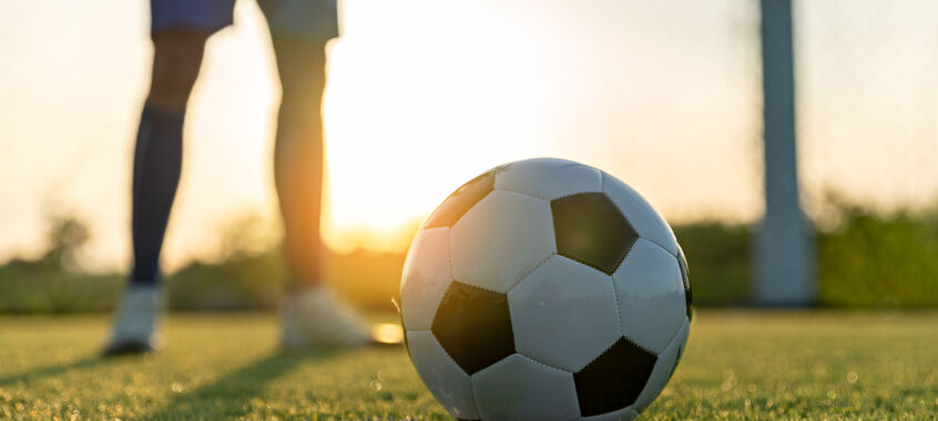bigstock Athlete Standing With Ball On  465434007