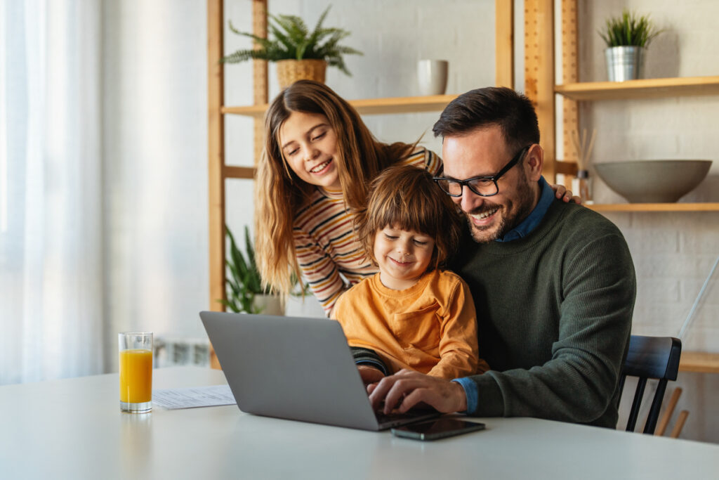 Family reading a newsletter