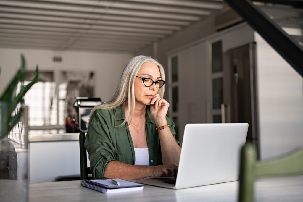 Woman reading a newsletter