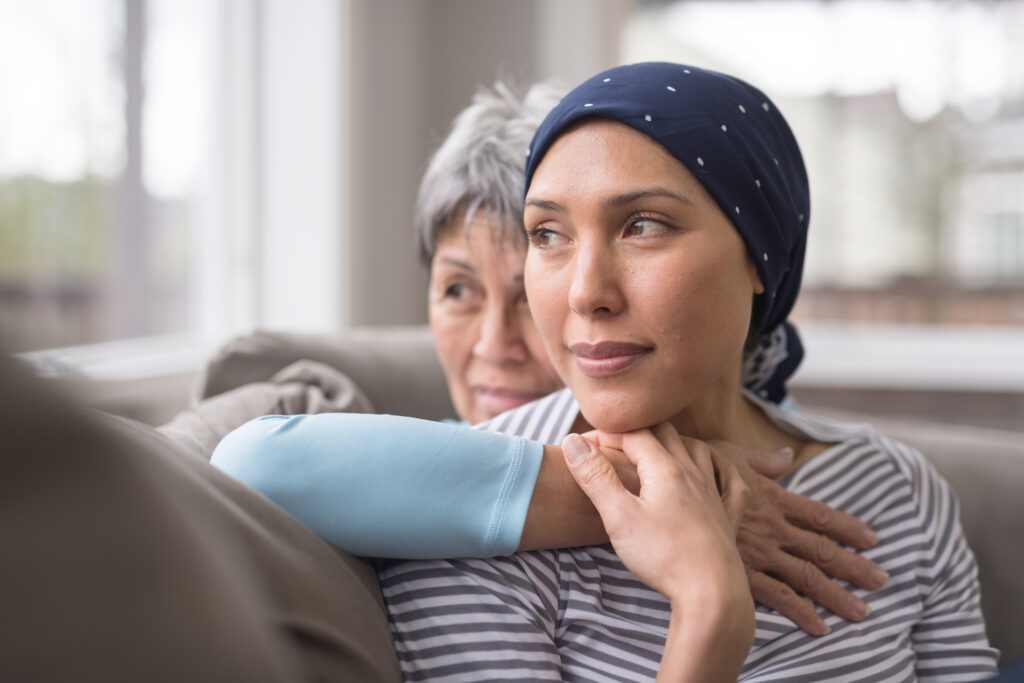 woman with no hair symbolising cancer treatment