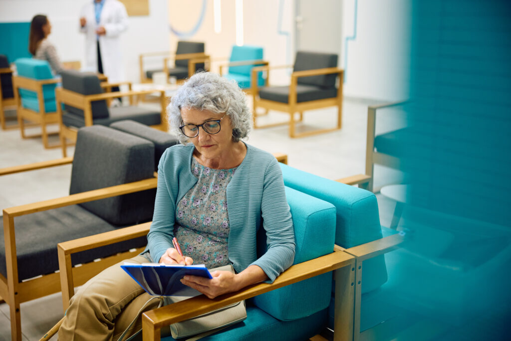 Woman sat in the GP
