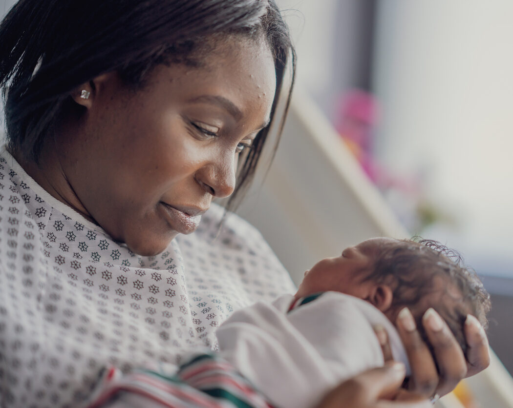Mother holding newborn