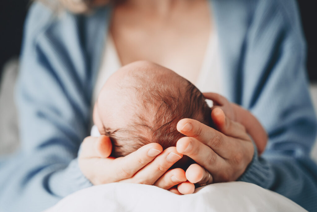 Mother holding newborn
