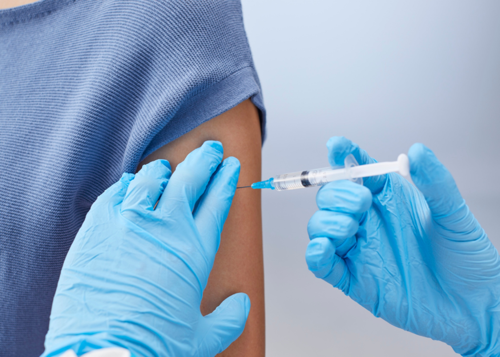 image of nurse administering vaccine